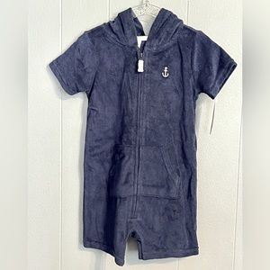 Terrycloth romper shorts with hood. Nautical details.